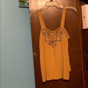 A tan tank top soft shirt